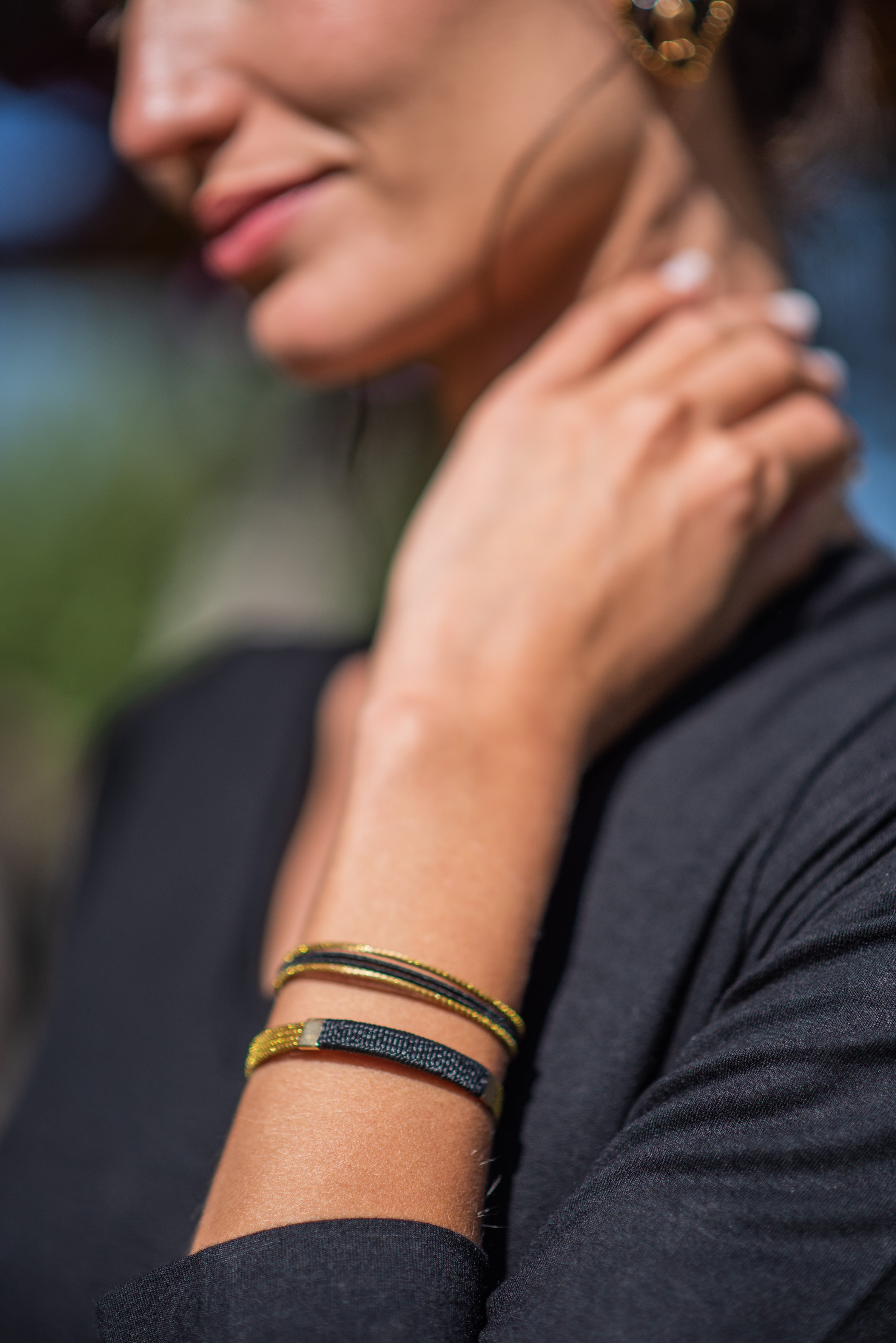 PULSERA NEGRO - DORADO