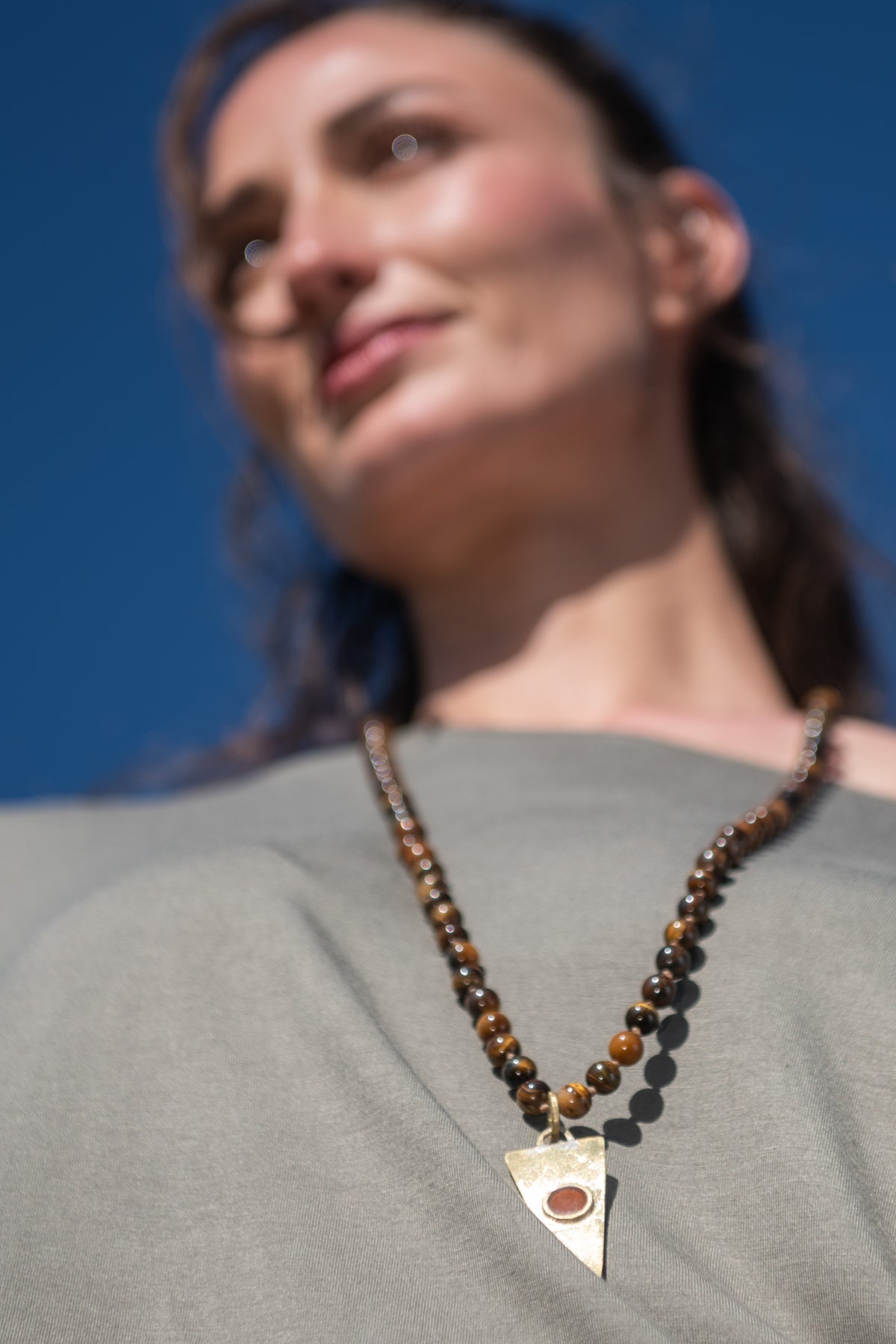 COLLAR TRIANGULO BRONCE